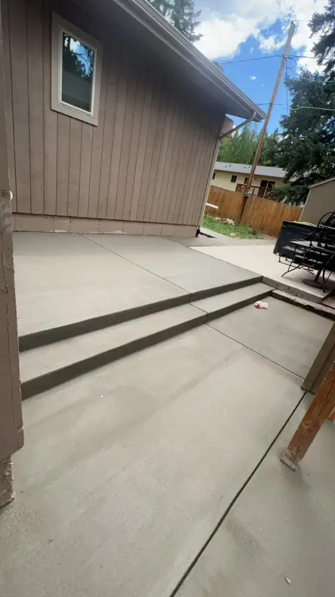 Clean concrete patio slab for backyard entertaining