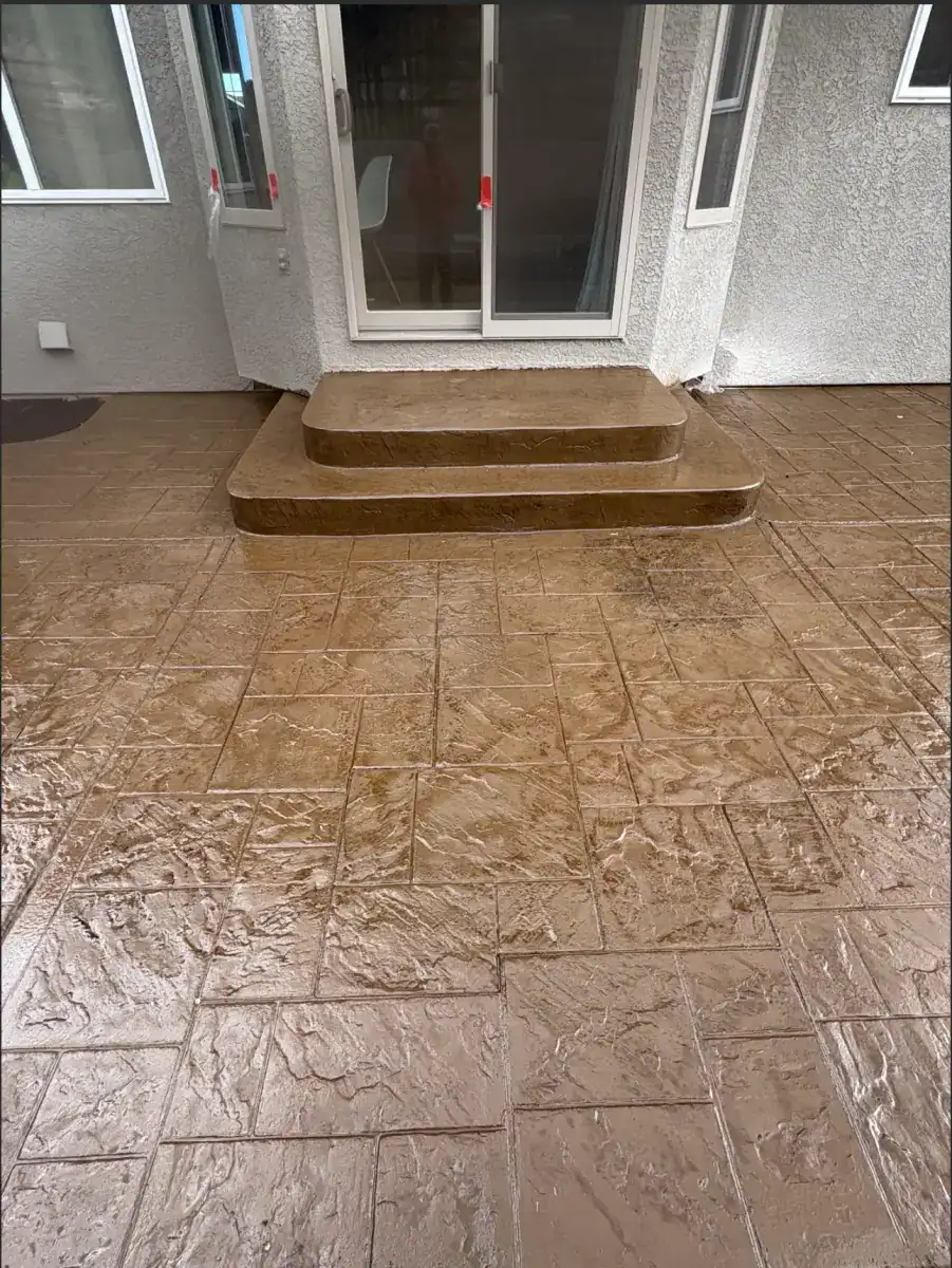 Ashlar slate stamped patio in earth tones