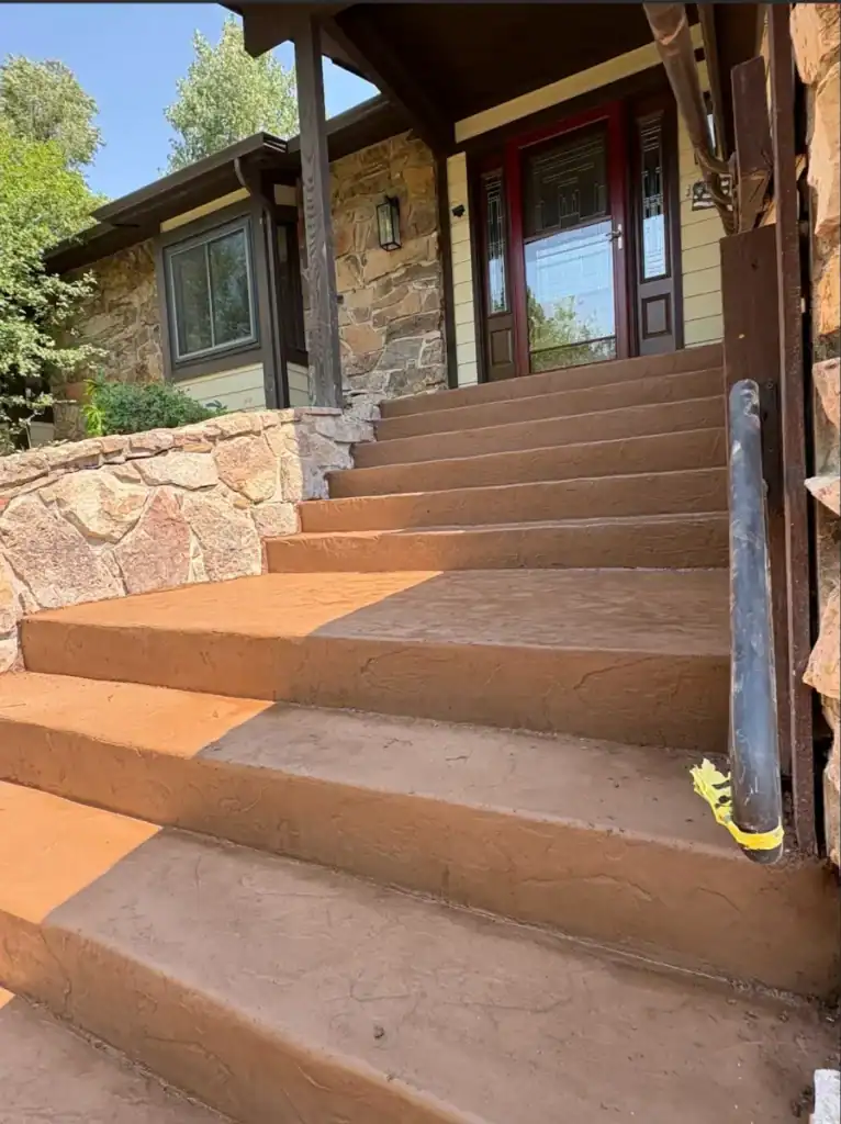 Durable custom concrete steps and walkways by CrestStone Concrete in residential settings.