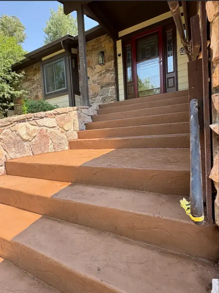 Durable custom concrete steps and walkways by CrestStone Concrete in residential settings.